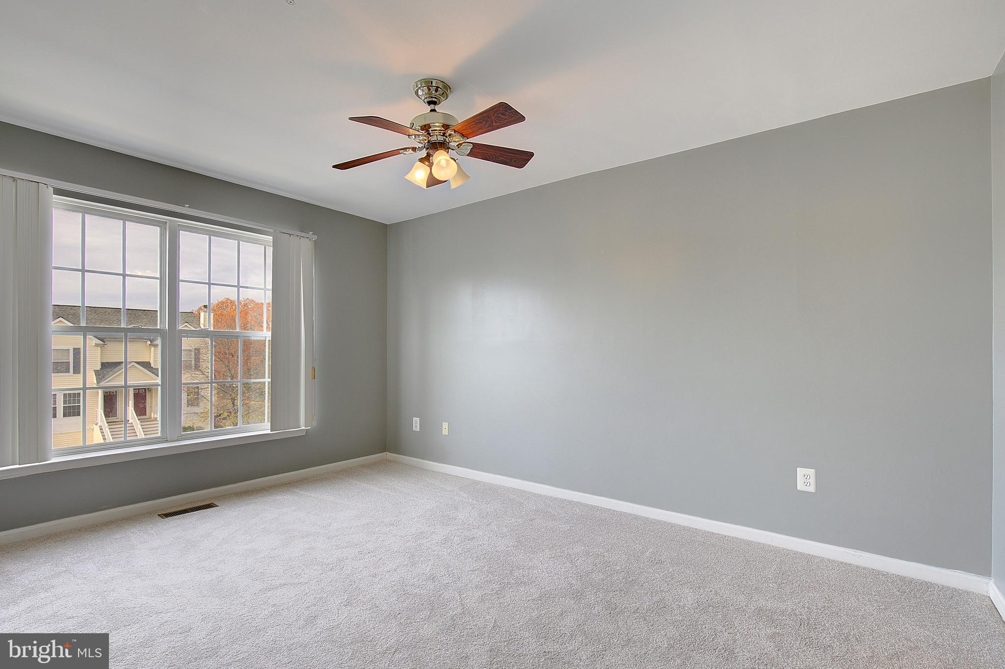 1700 Fallowfield Court Crofton, MD 21114 - Photo 22 of 34 a view of an empty room with a window