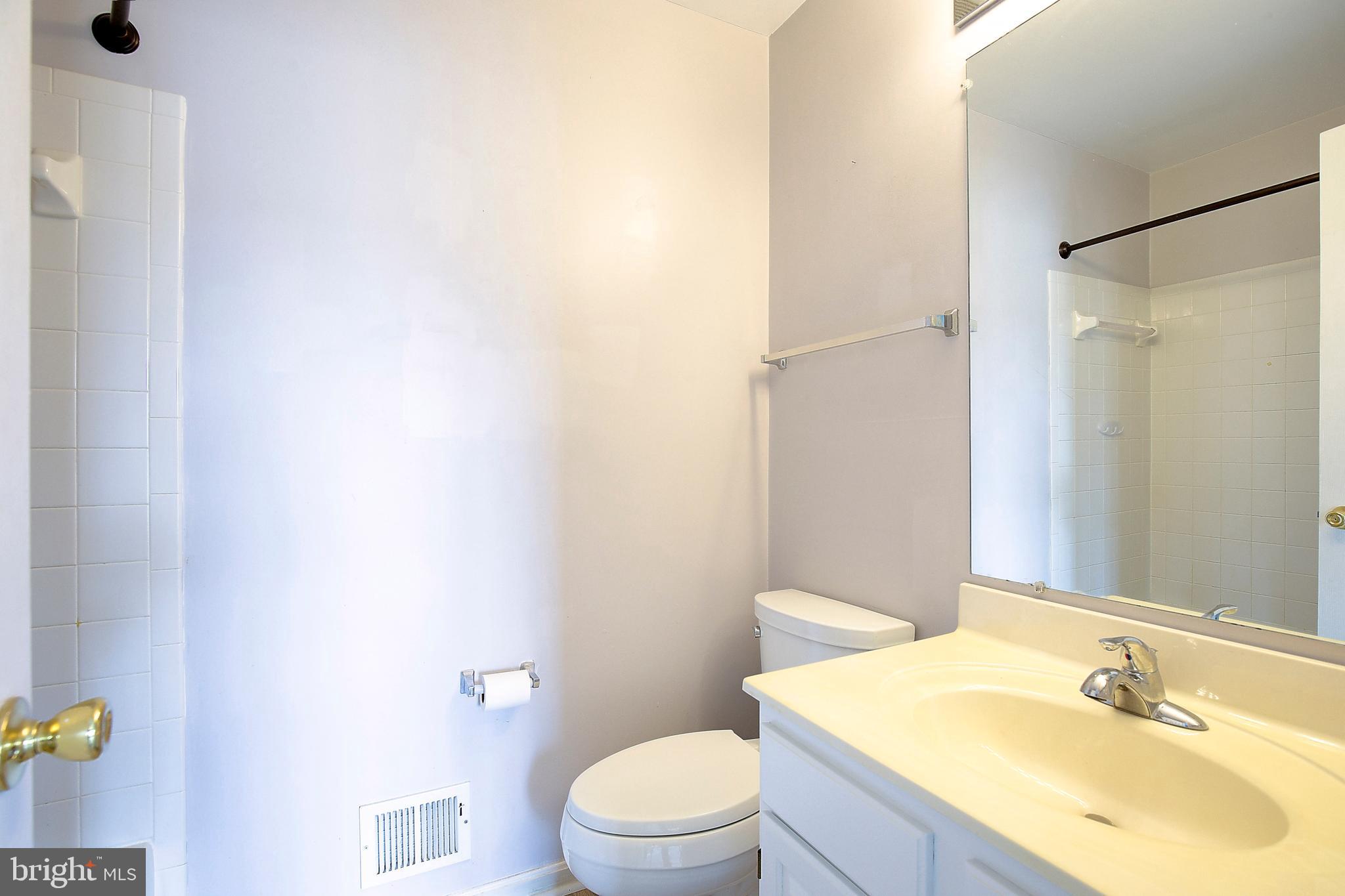 1700 Fallowfield Court Crofton, MD 21114 - Photo 24 of 34 a bathroom with a sink toilet and shower