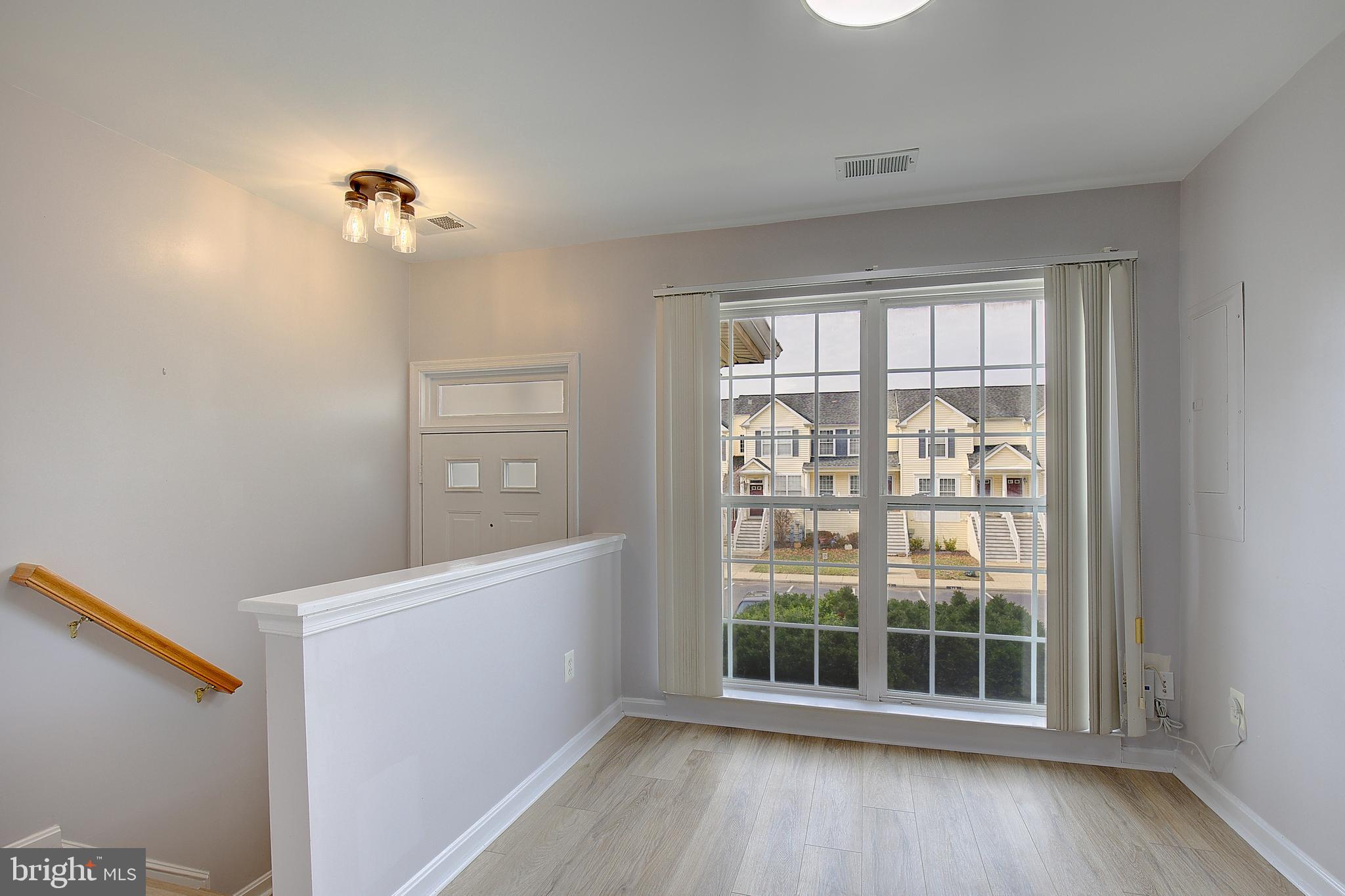 1700 Fallowfield Court Crofton, MD 21114 - Photo 3 of 34 a view of an empty room with a window