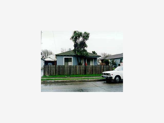 445 Rollins Road Burlingame, CA 94010 - Photo 1 of 1 a black and white photo of a yard