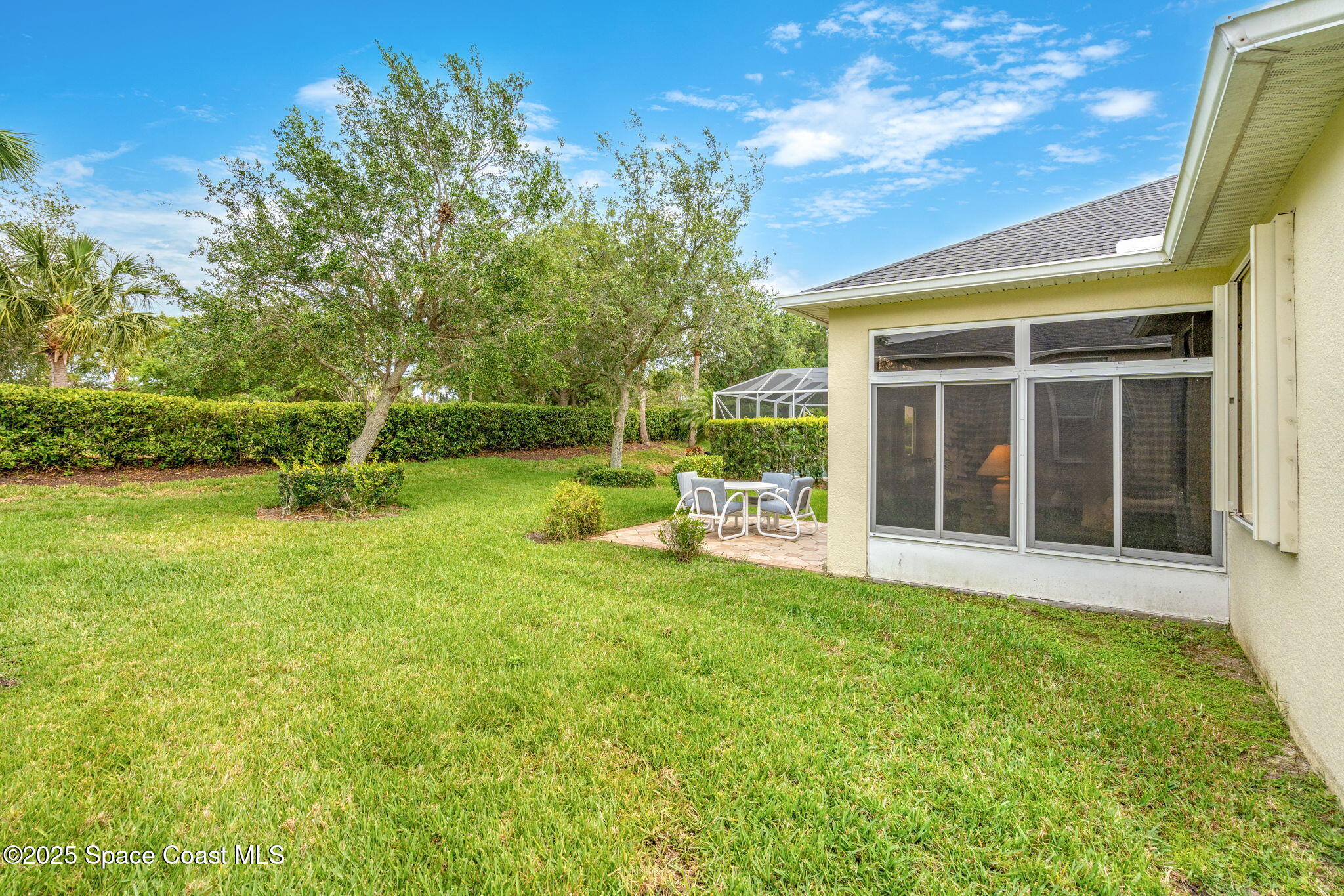 6741 Ringold Street Melbourne, FL 32940 - Photo 28 of 45 a view of a house with backyard and porch