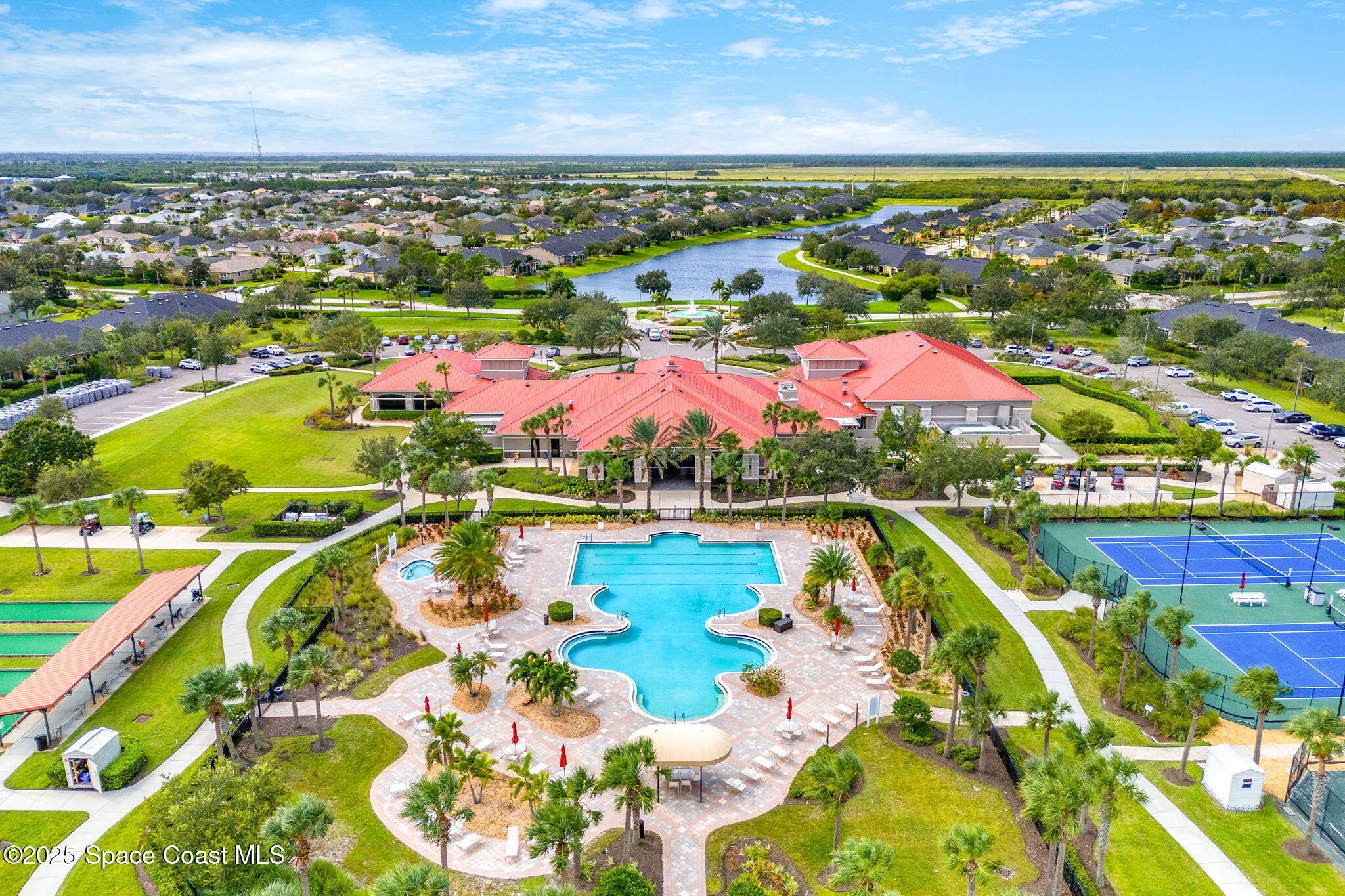 6741 Ringold Street Melbourne, FL 32940 - Photo 34 of 45 an aerial view of residential houses with outdoor space
