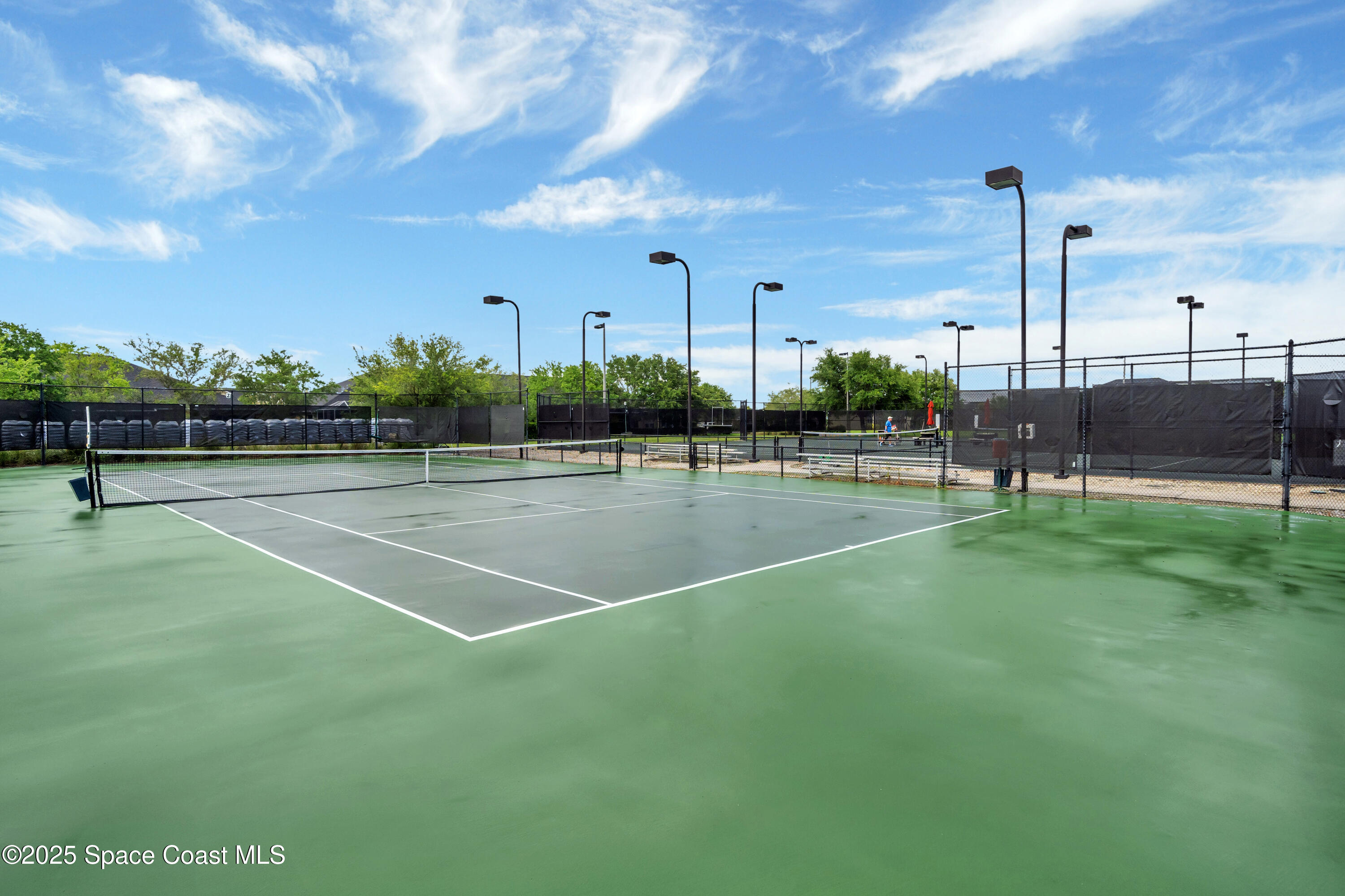 6741 Ringold Street Melbourne, FL 32940 - Photo 42 of 45 a view of a tennis court