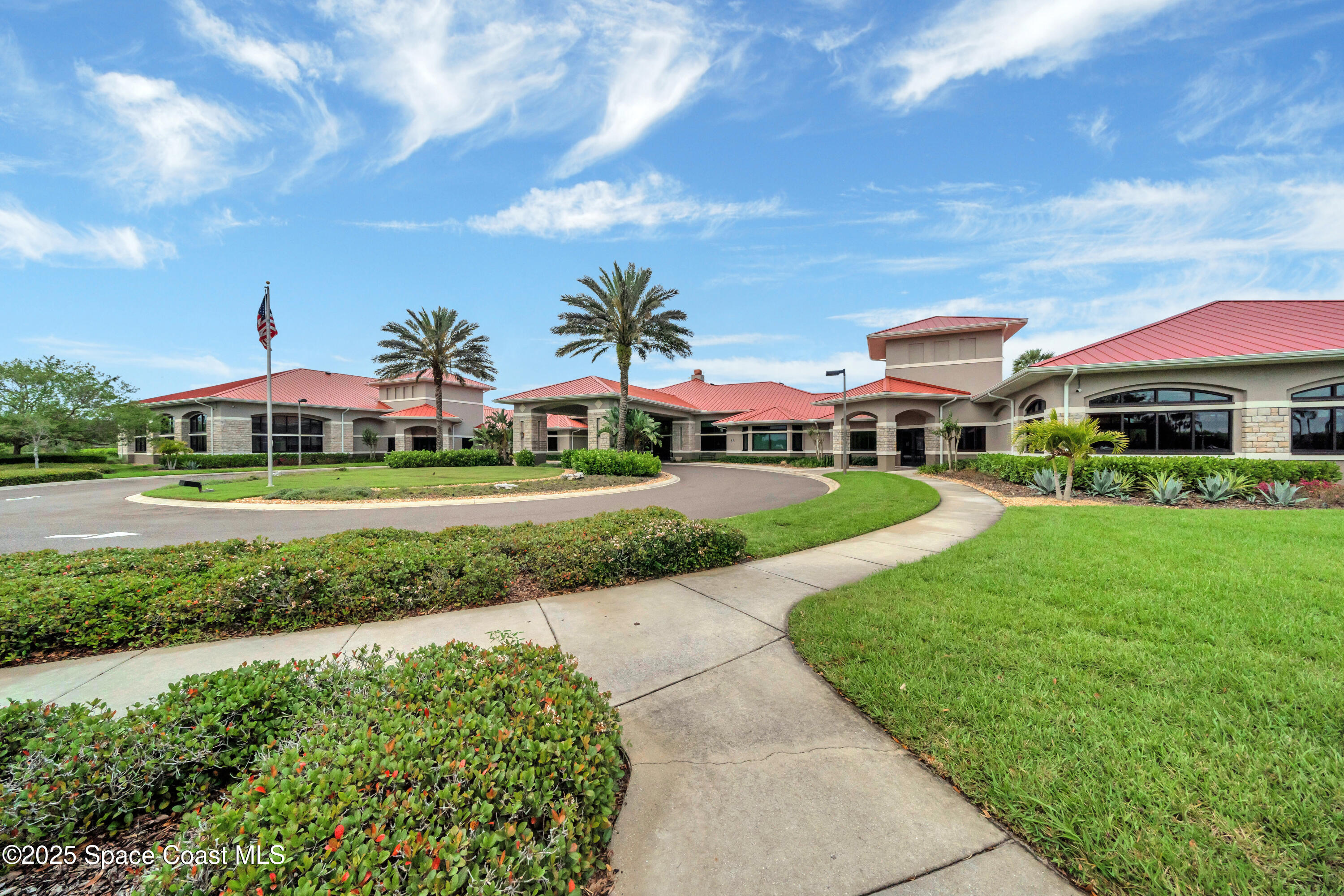6741 Ringold Street Melbourne, FL 32940 - Photo 43 of 45 a front view of a house with garden