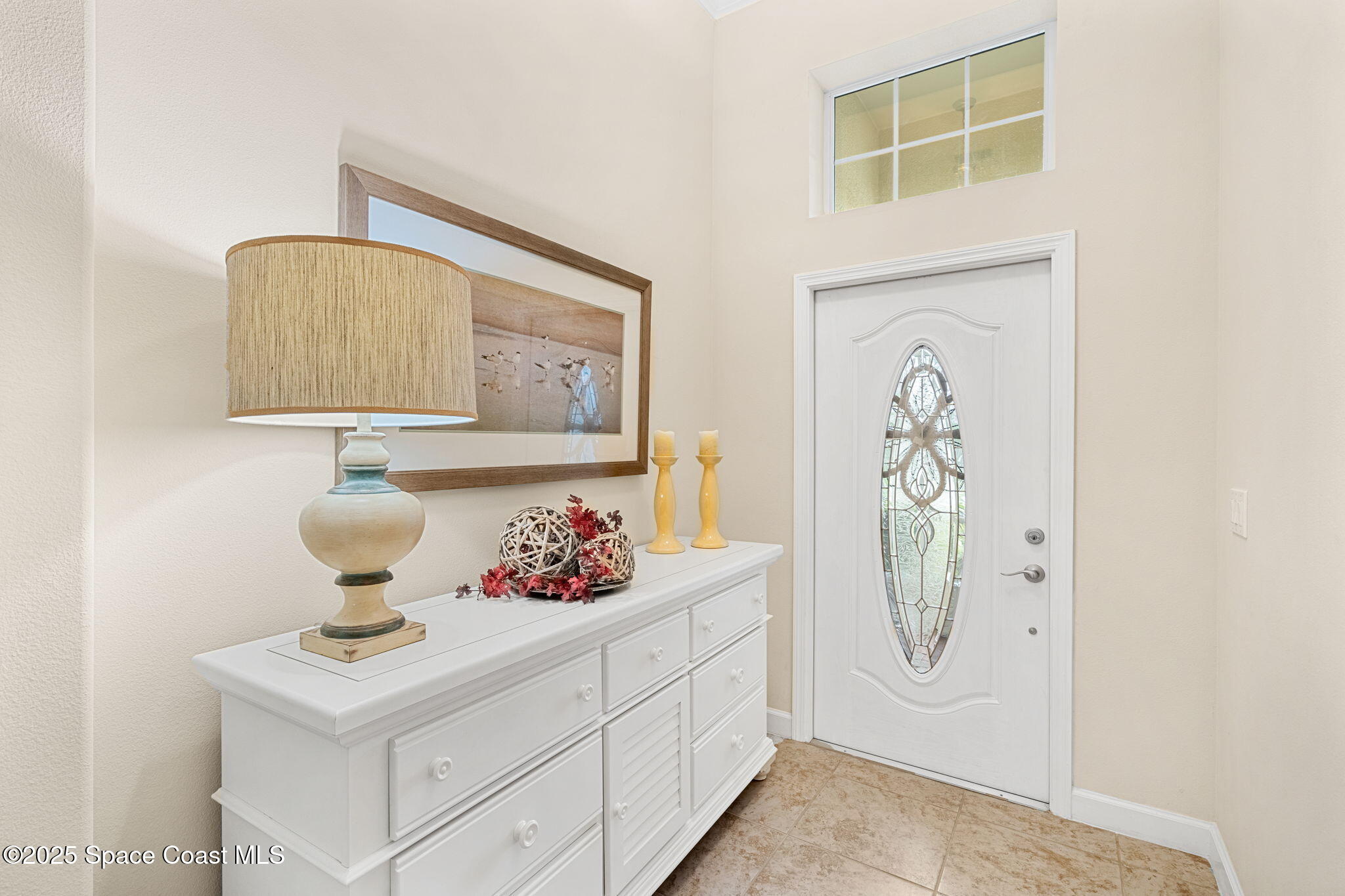 6741 Ringold Street Melbourne, FL 32940 - Photo 4 of 45 a bathroom with a sink and a mirror