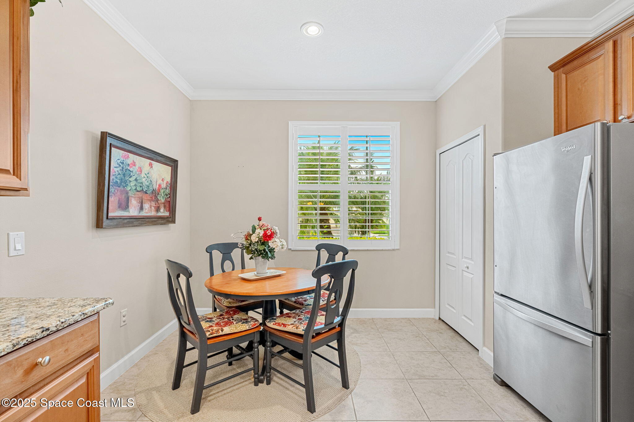 6741 Ringold Street Melbourne, FL 32940 - Photo 9 of 45 a dining room with furniture and window