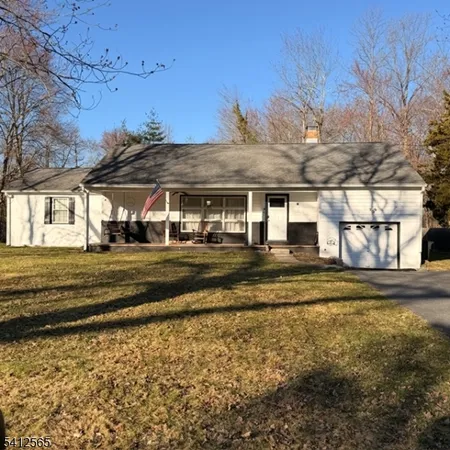 a view of a house with a big yard