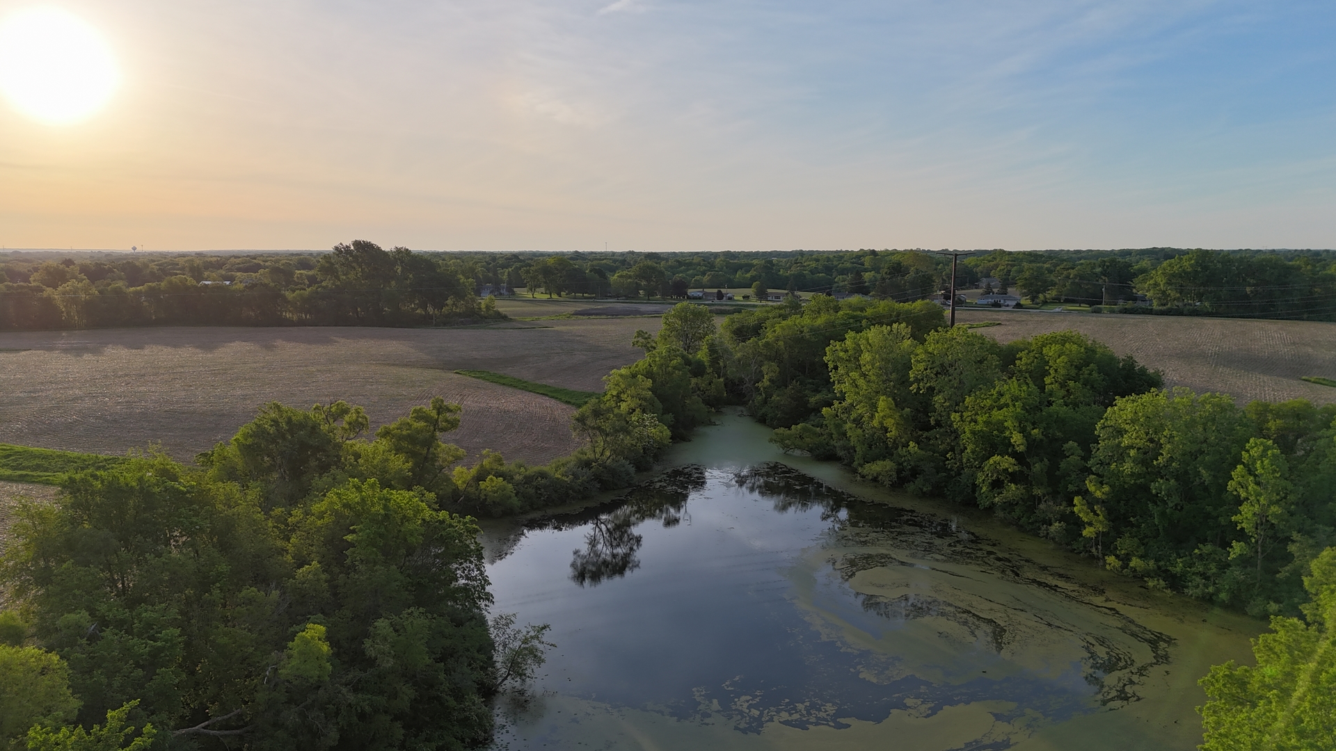 0 Ridgewood Road Milan, IL 61264 - Photo 17 of 43 a view of a lake from a yard