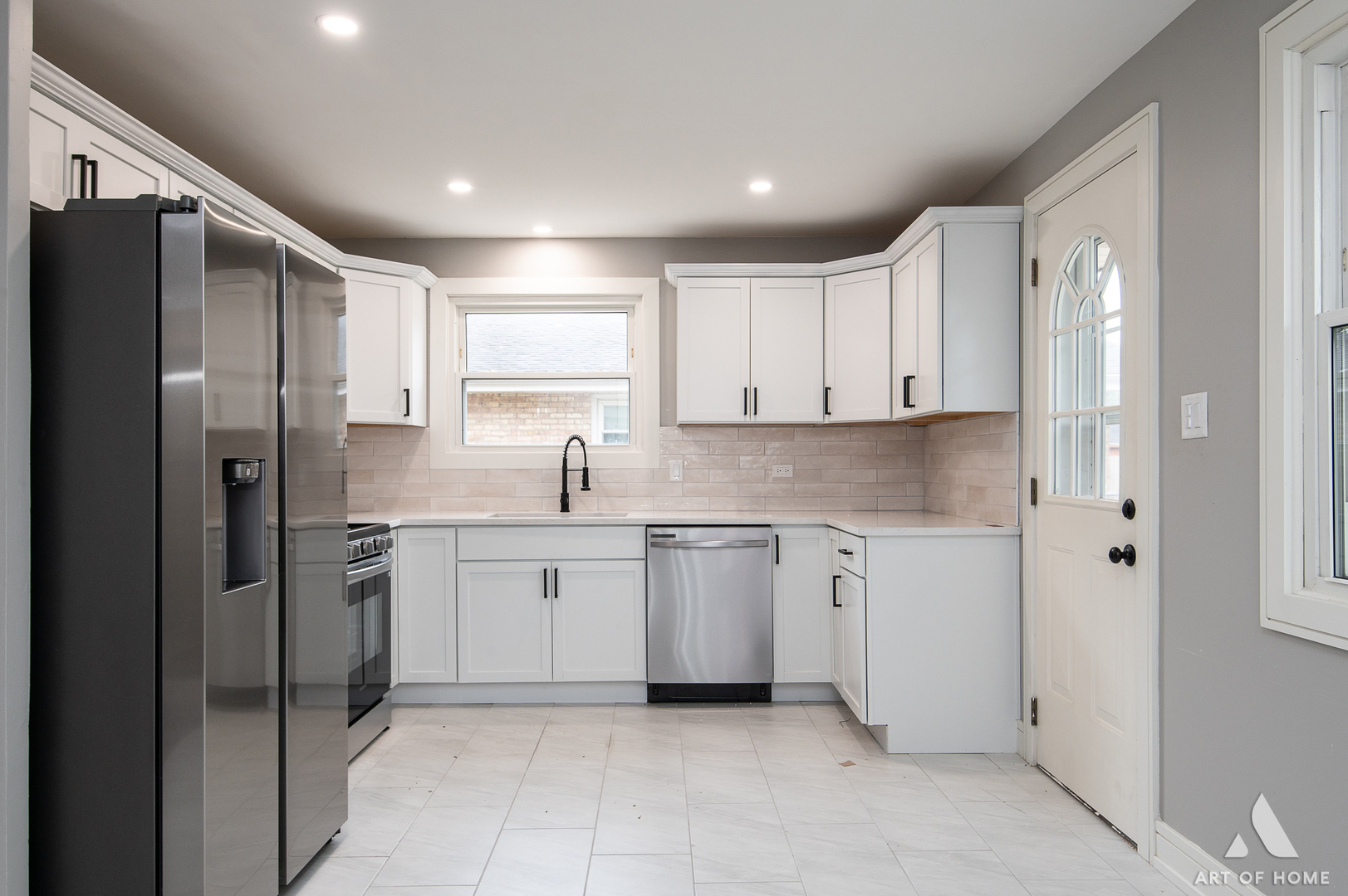 9128 Homestead Lane Bridgeview, IL 60455 - Photo 13 of 32 a kitchen with cabinets and stainless steel appliances