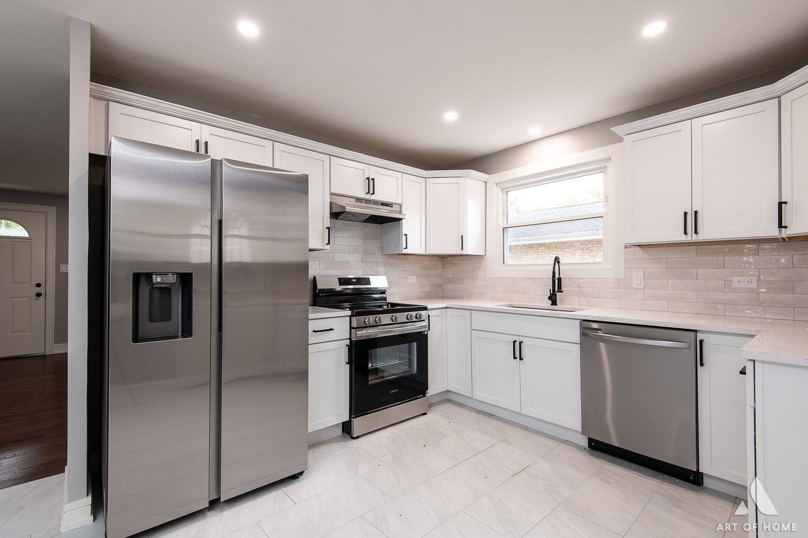 9128 Homestead Lane Bridgeview, IL 60455 - Photo 14 of 32 a kitchen with a refrigerator sink and cabinets