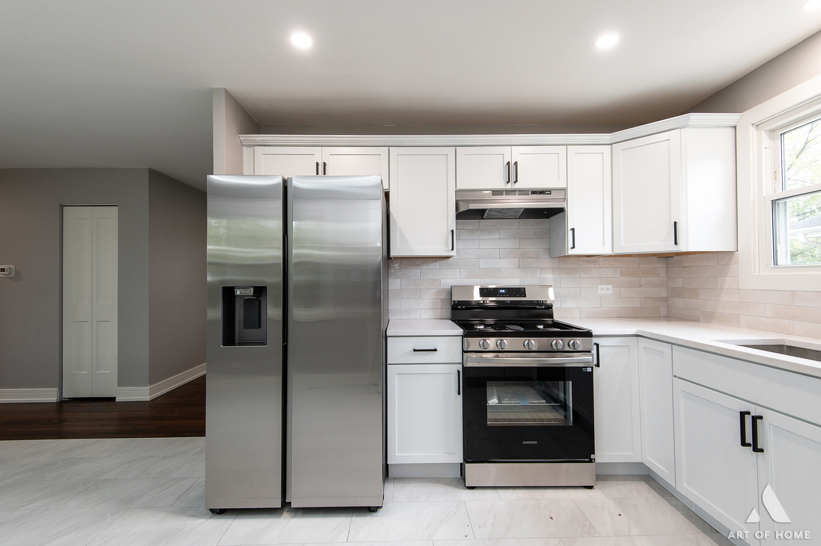 9128 Homestead Lane Bridgeview, IL 60455 - Photo 15 of 32 a kitchen with stainless steel appliances granite countertop a stove and a refrigerator