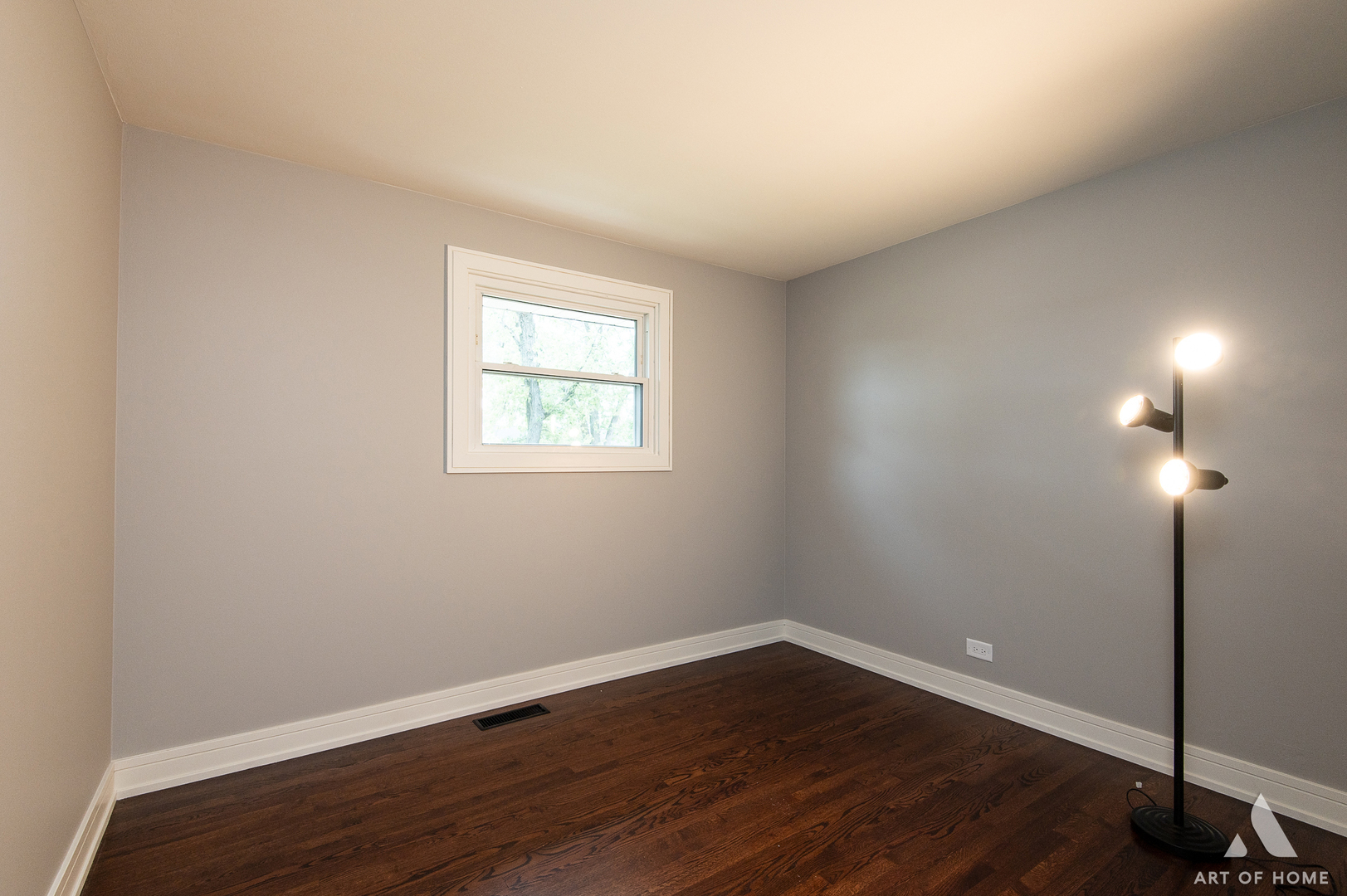 9128 Homestead Lane Bridgeview, IL 60455 - Photo 20 of 32 a view of an empty room with wooden floor and a window