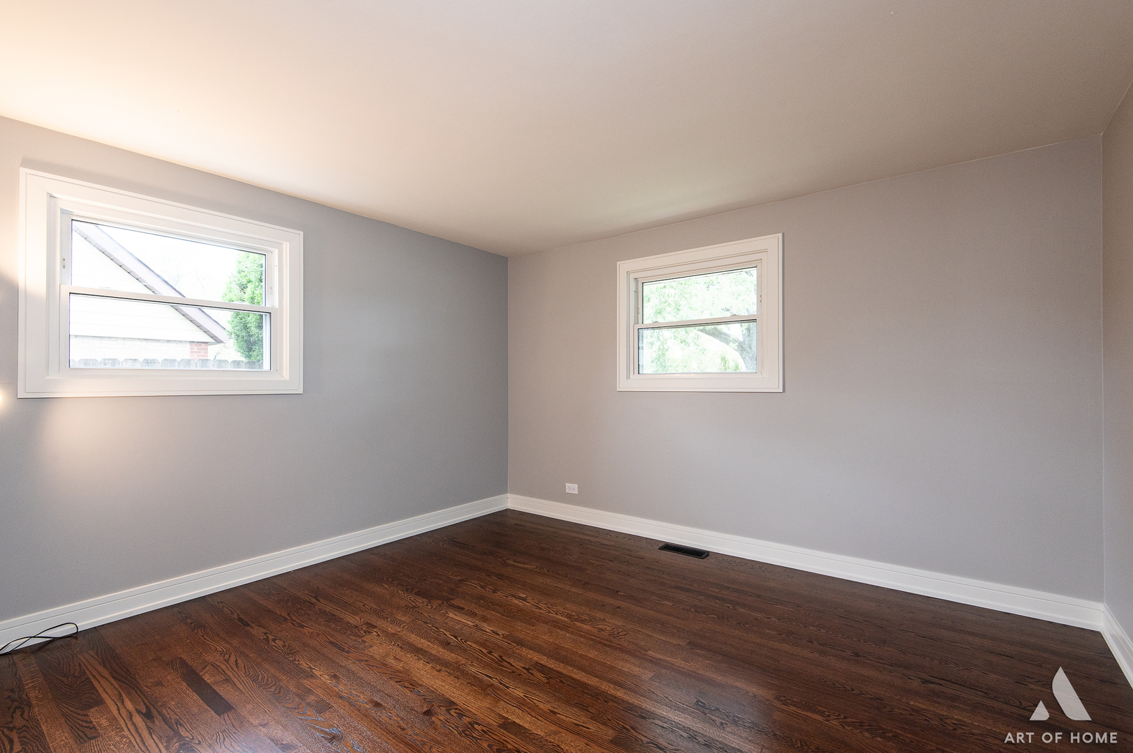 9128 Homestead Lane Bridgeview, IL 60455 - Photo 22 of 32 a view of an empty room with wooden floor and a window