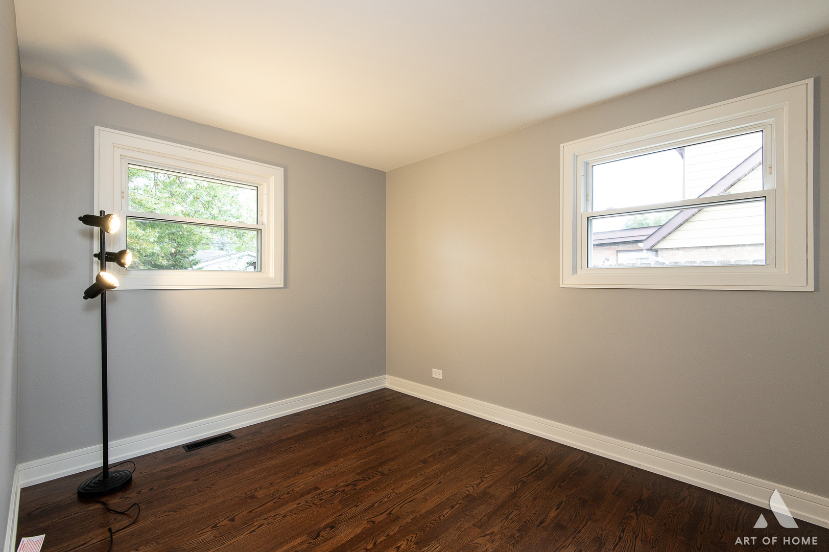 9128 Homestead Lane Bridgeview, IL 60455 - Photo 24 of 32 a view of an empty room with wooden floor and a window