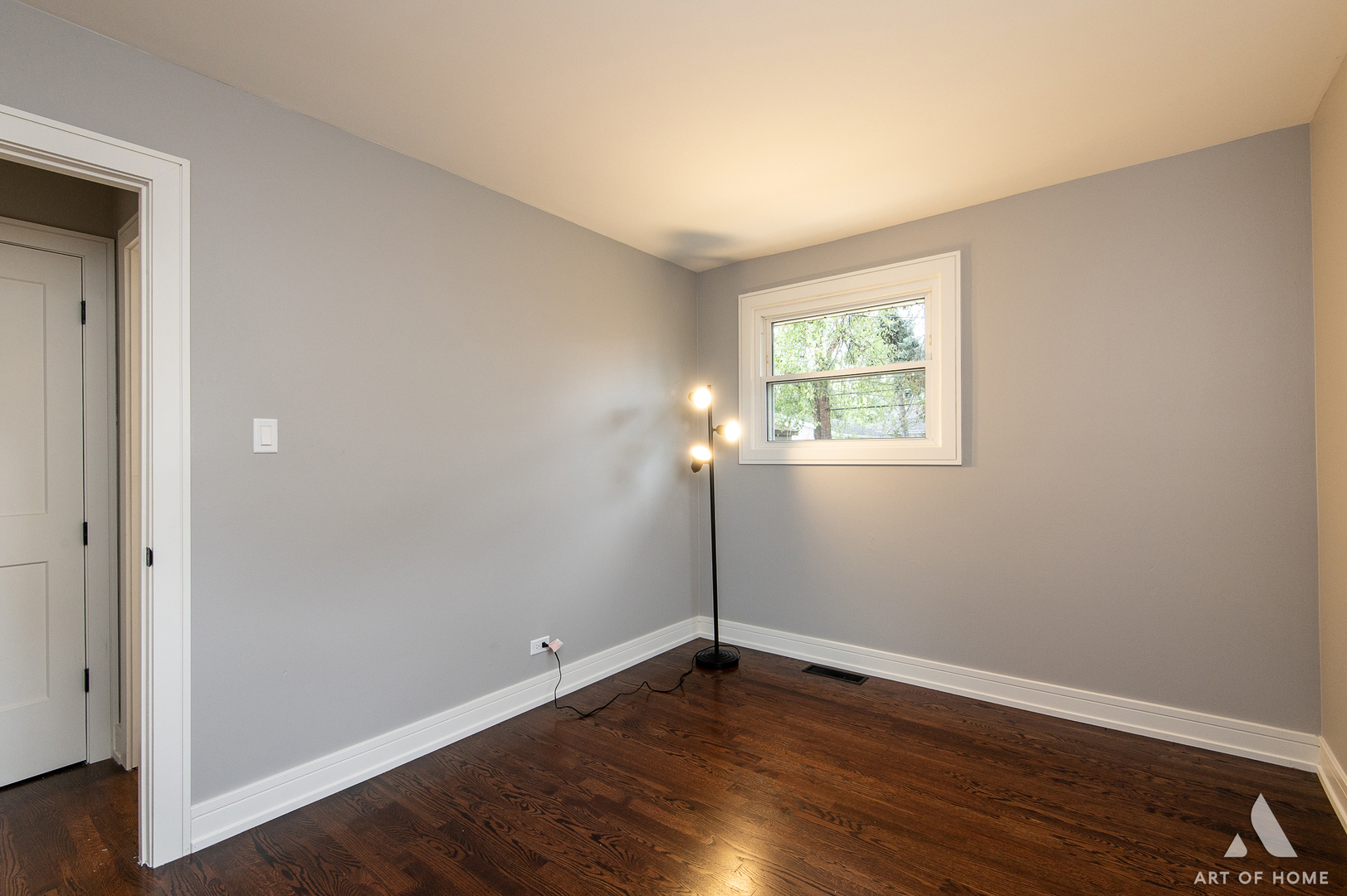 9128 Homestead Lane Bridgeview, IL 60455 - Photo 25 of 32 an empty room with wooden floor and windows