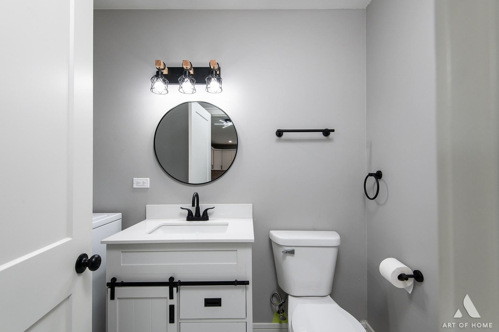 9128 Homestead Lane Bridgeview, IL 60455 - Photo 26 of 32 a bathroom with a toilet sink and mirror