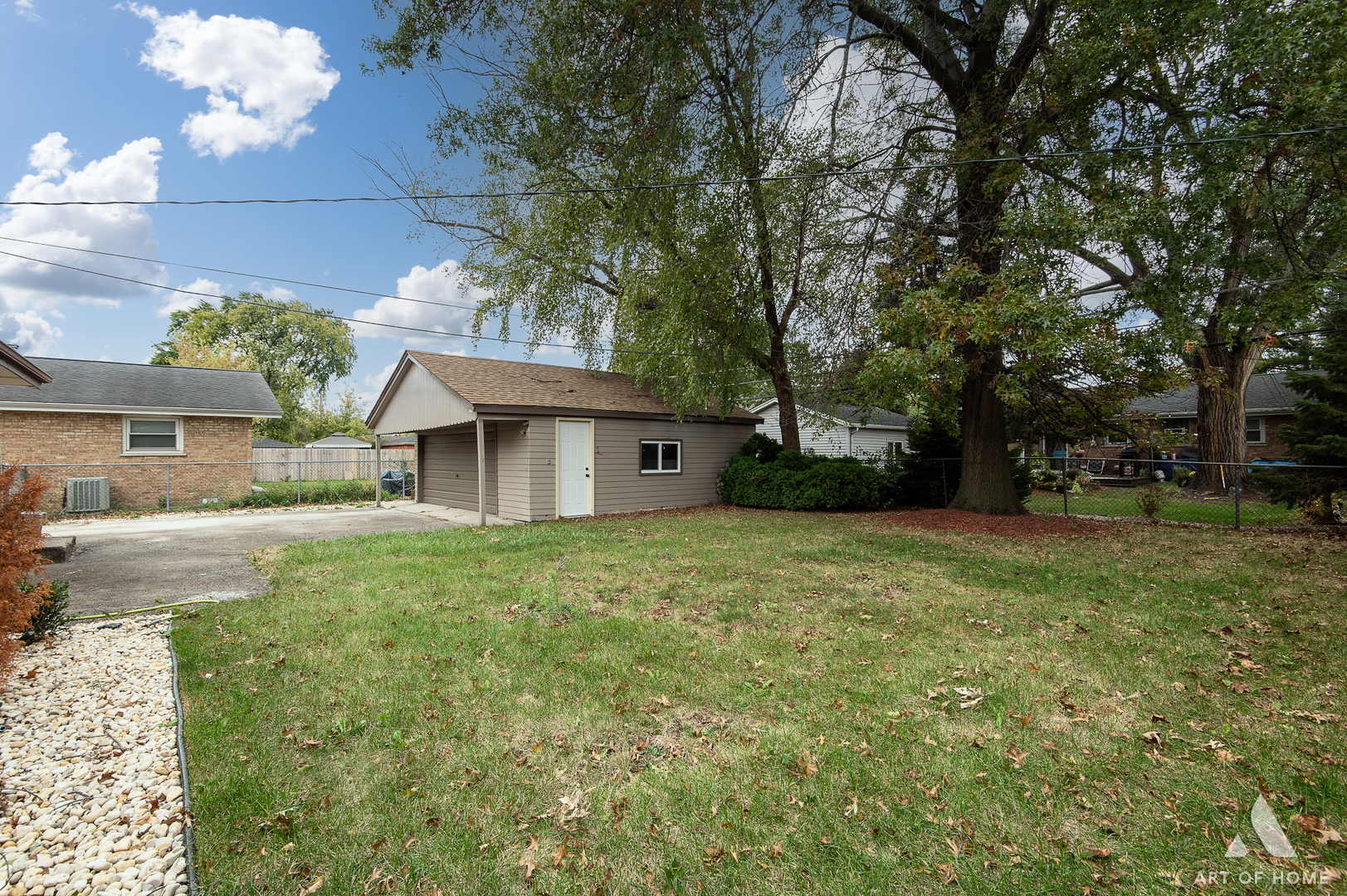 9128 Homestead Lane Bridgeview, IL 60455 - Photo 31 of 32 a view of a house with backyard and garden
