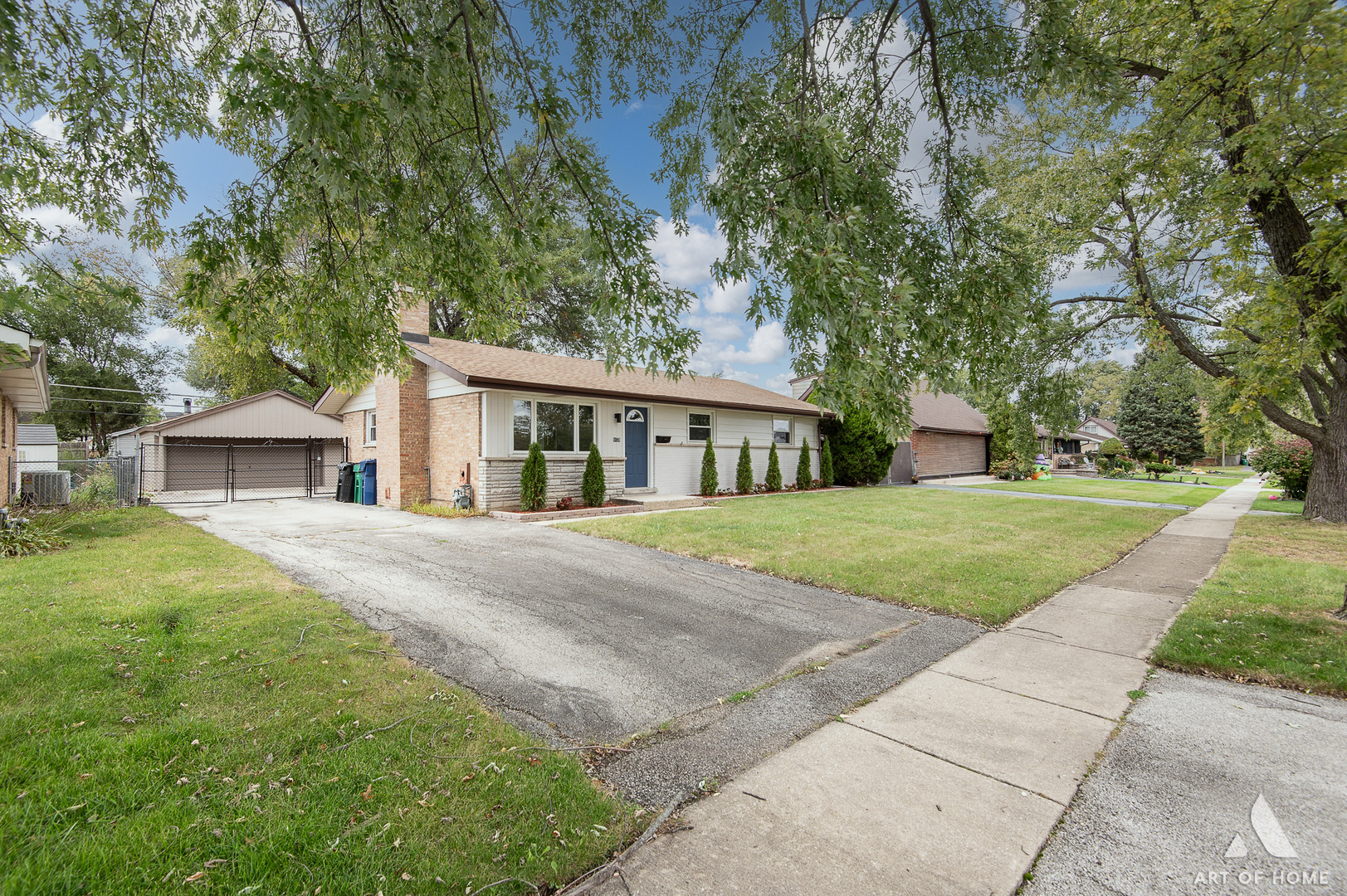 9128 Homestead Lane Bridgeview, IL 60455 - Photo 4 of 32 a front view of a house with yard and green space