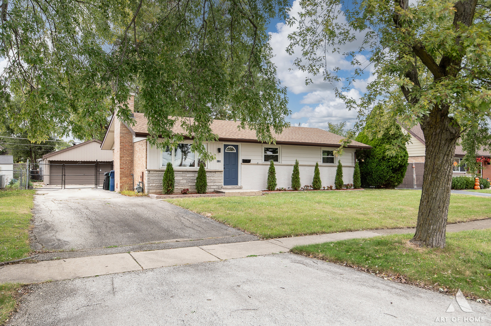 9128 Homestead Lane Bridgeview, IL 60455 - Photo 5 of 32 front view of a house with a yard