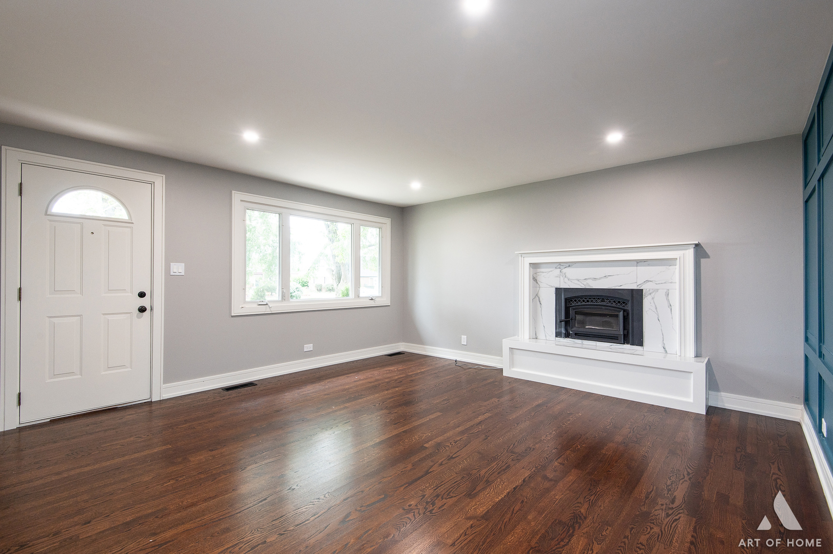 9128 Homestead Lane Bridgeview, IL 60455 - Photo 8 of 32 a view of an empty room with wooden floor and a window