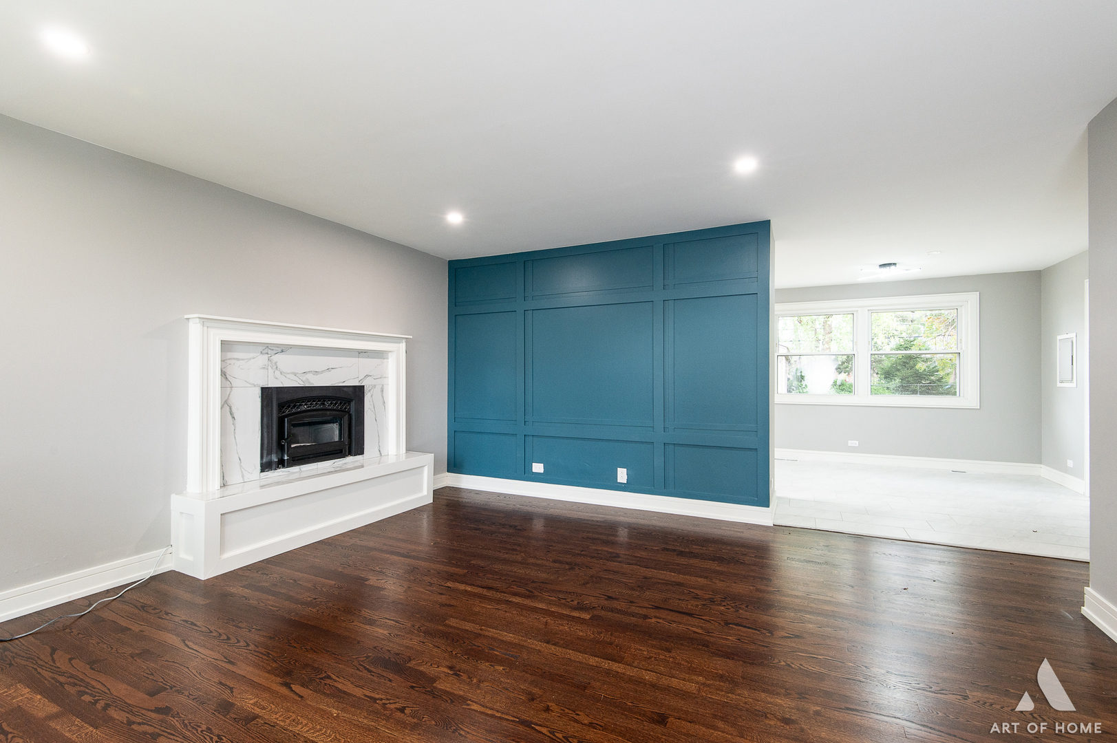 9128 Homestead Lane Bridgeview, IL 60455 - Photo 10 of 32 an empty room with wooden floor and a fireplace