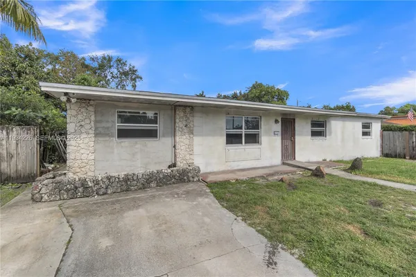 front view of house with a yard