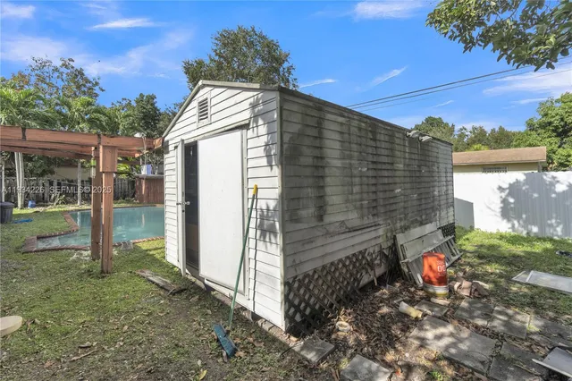 a backyard of a house with seating space