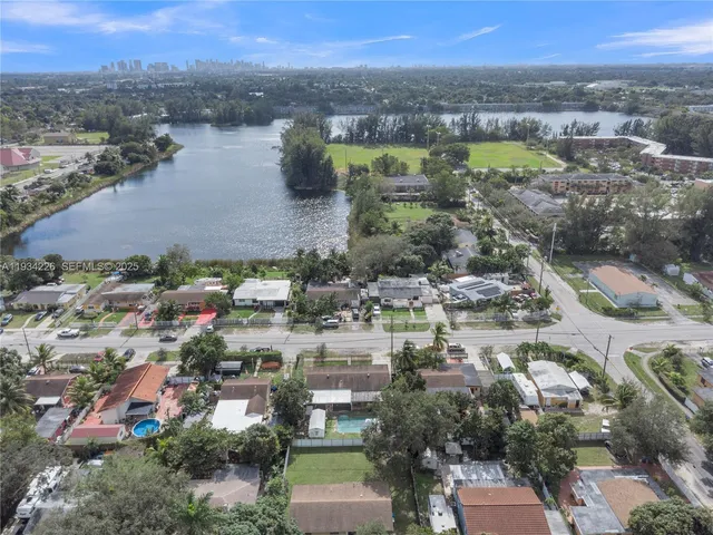 a view of a lake with a city