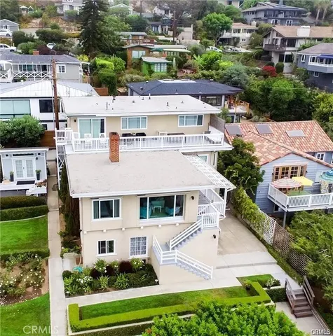 an aerial view of a house with a garden