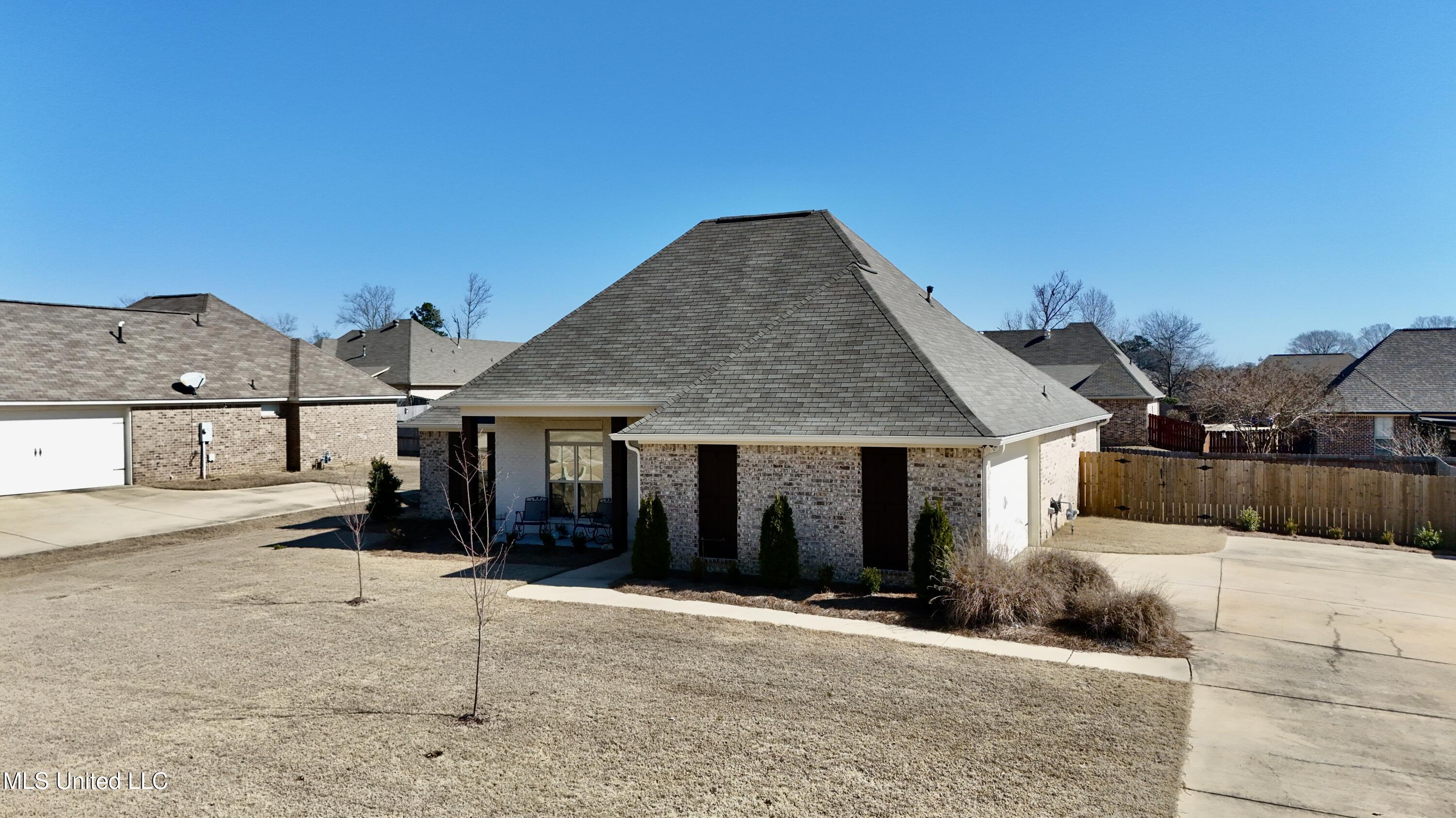 245 Falls Crossing Madison, MS 39110 - Photo 4 of 43 dji_fly_20260202_112430_0658_17700618328