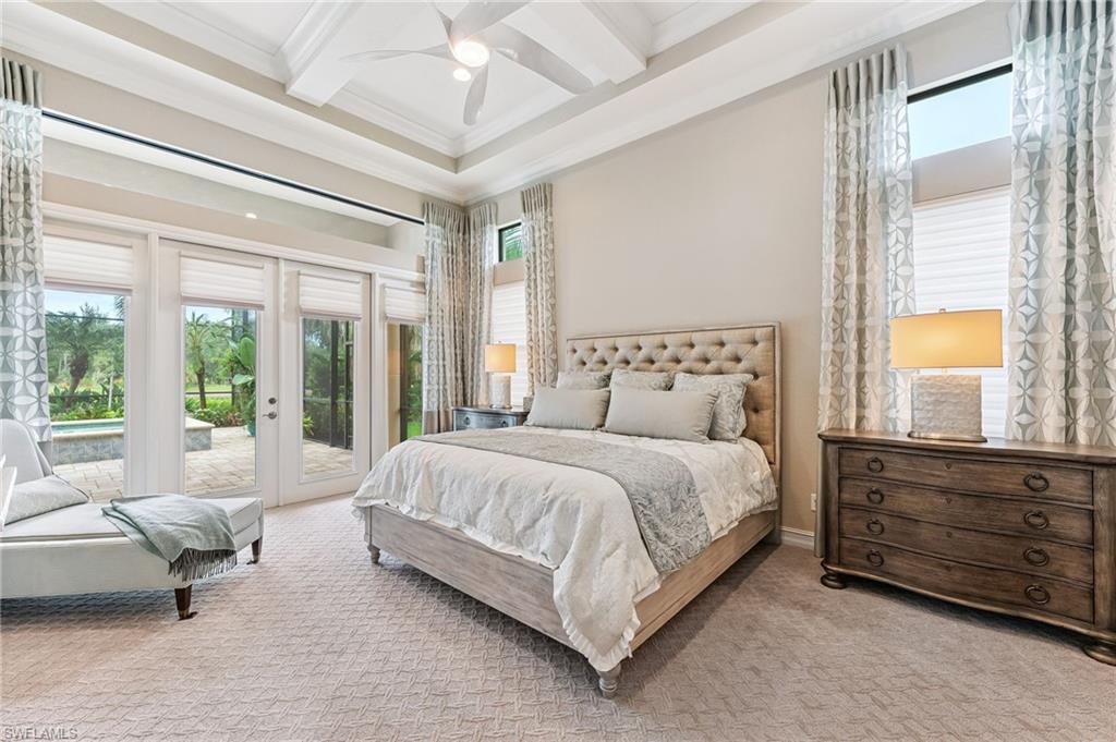 11974 Maidstone Court Naples, FL 34120 - Photo 32 of 45 Carpeted bedroom featuring access to exterior, ornamental molding, beamed ceiling, coffered ceiling, and a ceiling fan