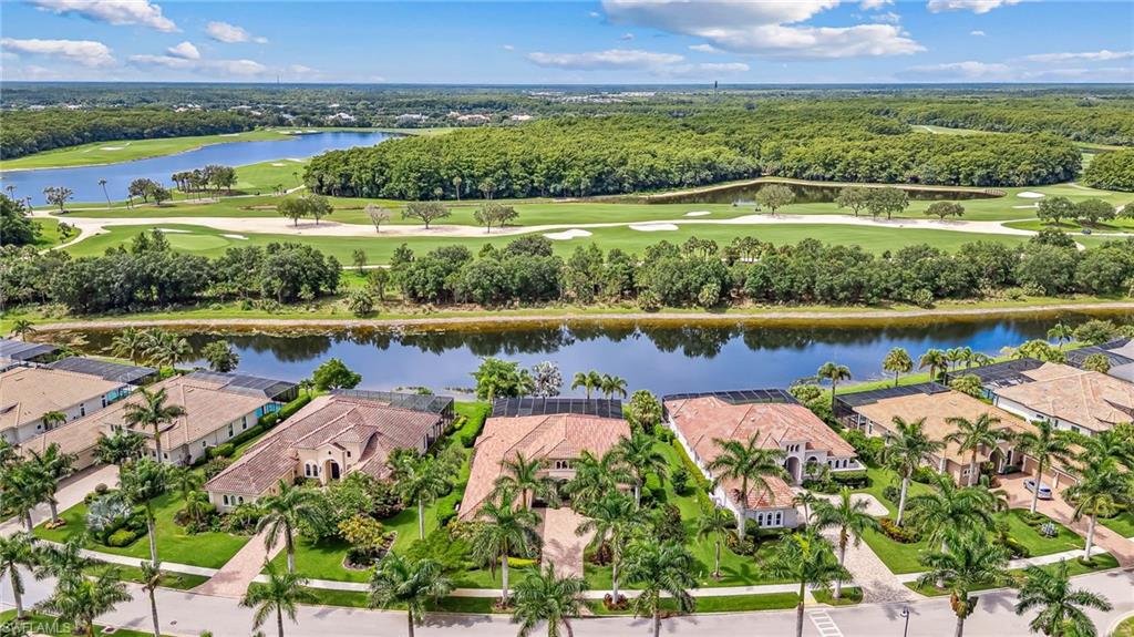 11974 Maidstone Court Naples, FL 34120 - Photo 41 of 45 Aerial perspective of suburban area with a golf club and a nearby body of water