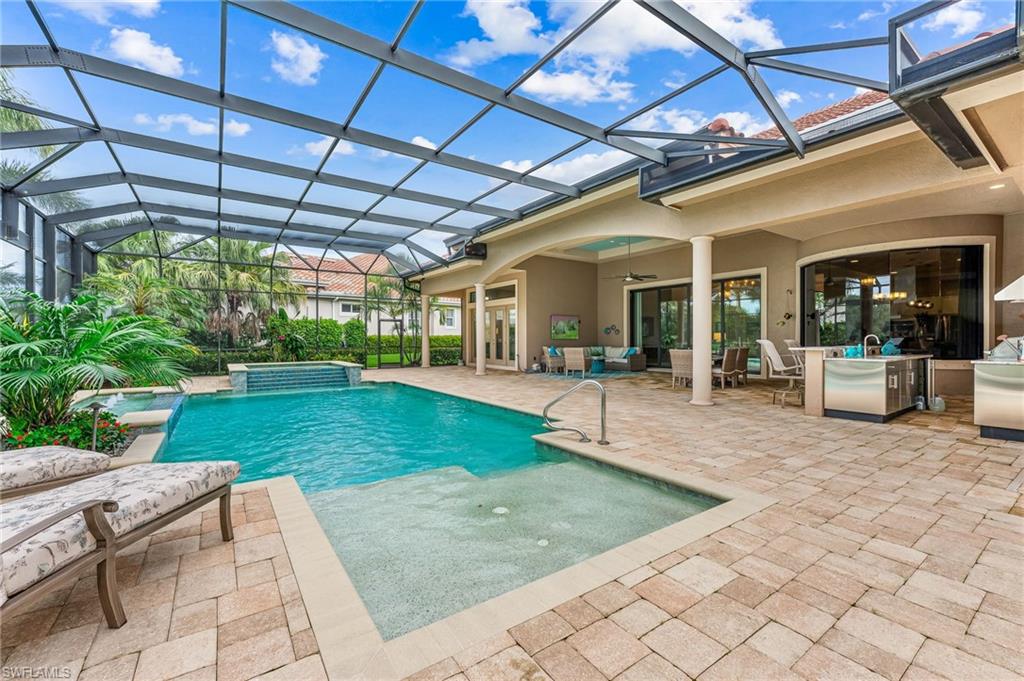 11974 Maidstone Court Naples, FL 34120 - Photo 9 of 45 Outdoor pool with a patio area, ceiling fan, outdoor lounge area, and a hot tub