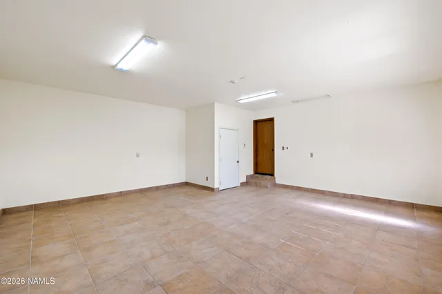 an empty room with an entryway