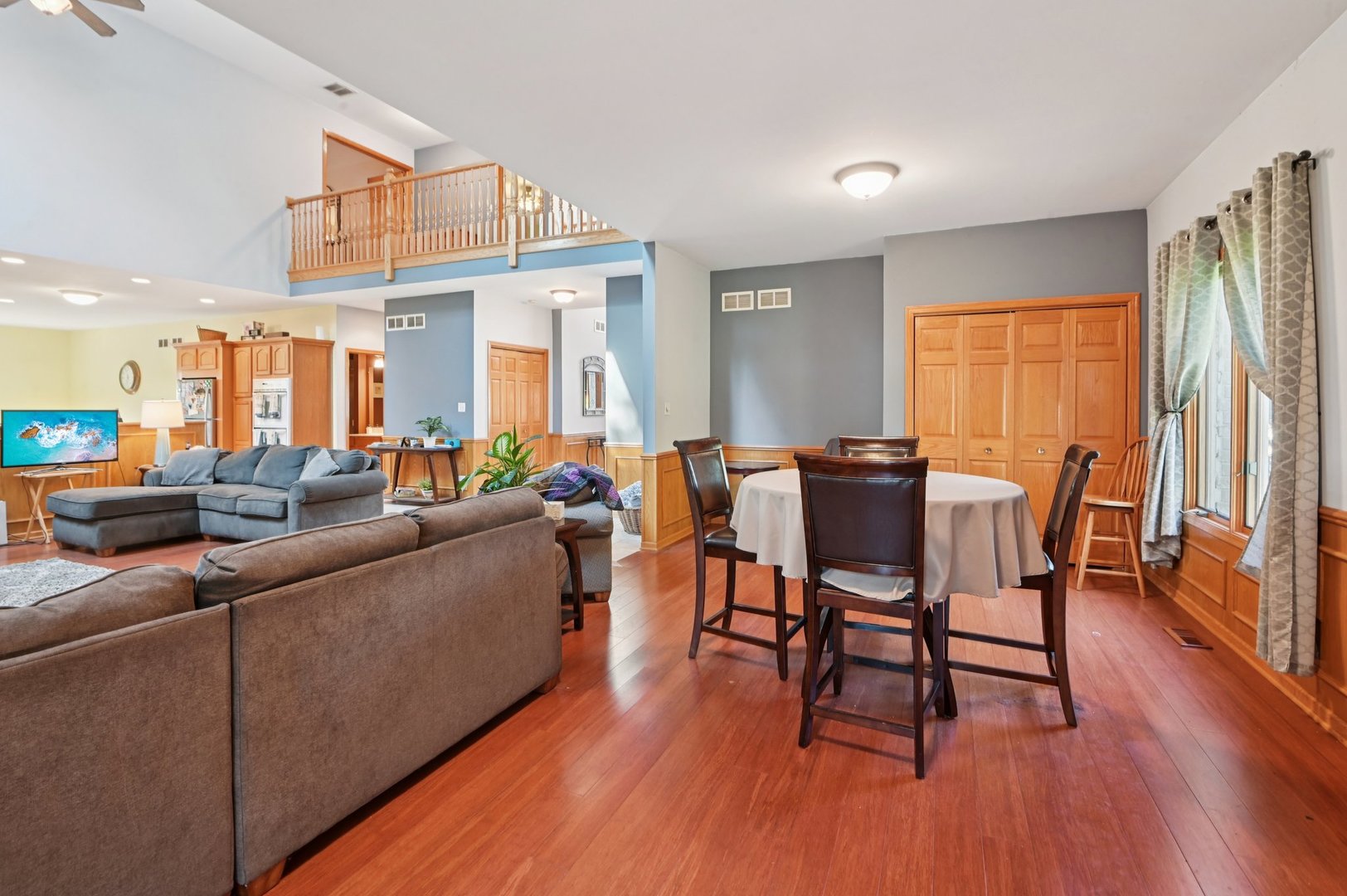 1575 Benton Street Crete, IL 60417 - Photo 13 of 66 a living room with furniture a wooden floor and a window