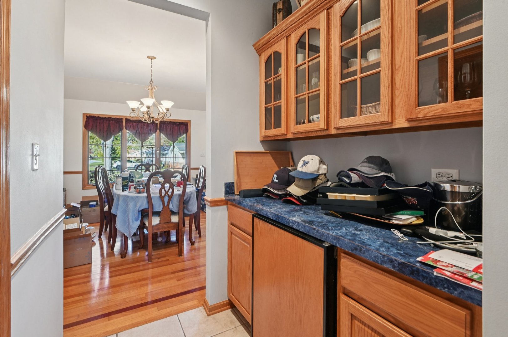 1575 Benton Street Crete, IL 60417 - Photo 15 of 66 a kitchen area with granite countertop a stove a sink and a dining table