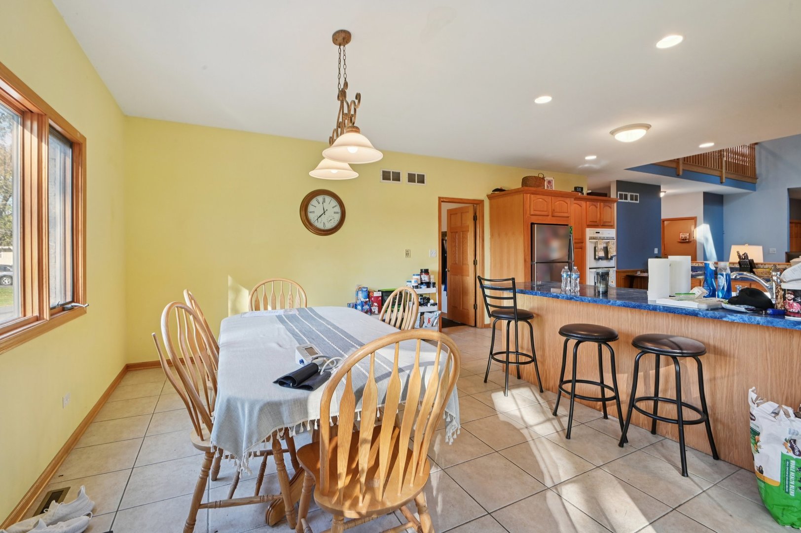 1575 Benton Street Crete, IL 60417 - Photo 17 of 66 a view of a dining room with furniture and a table