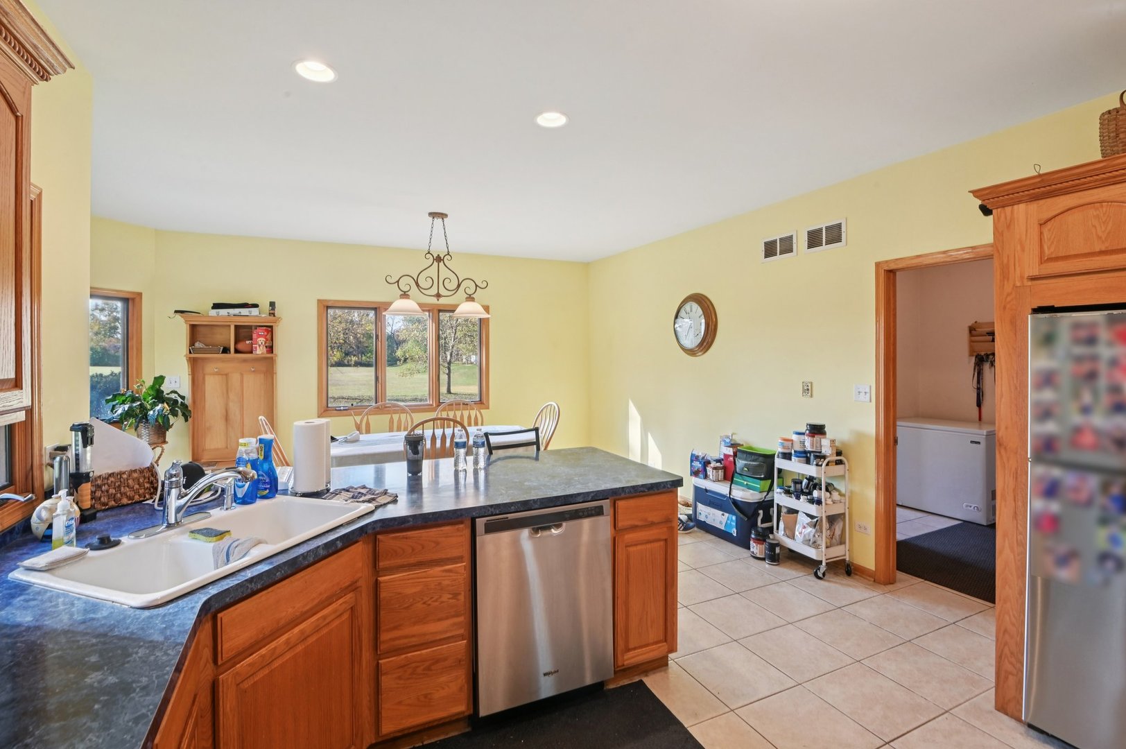 1575 Benton Street Crete, IL 60417 - Photo 21 of 66 a spacious bathroom with double vanity sinks a mirror and a shower