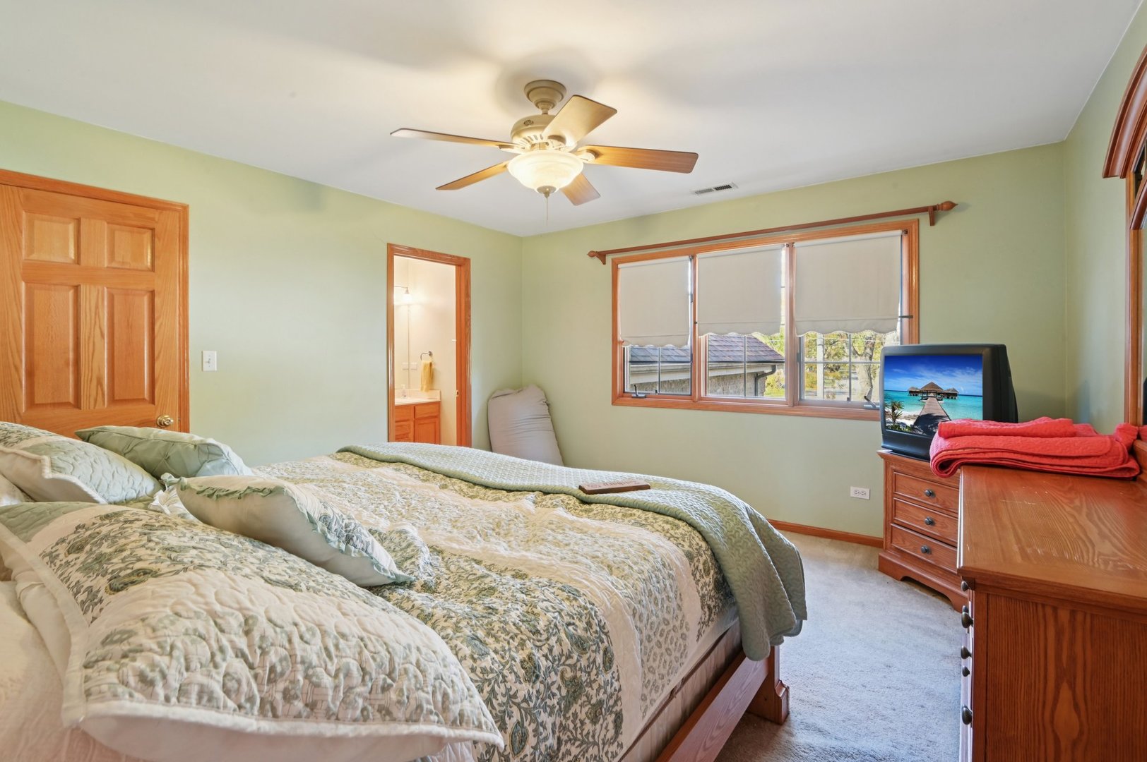 1575 Benton Street Crete, IL 60417 - Photo 36 of 66 a bedroom with a bed and window