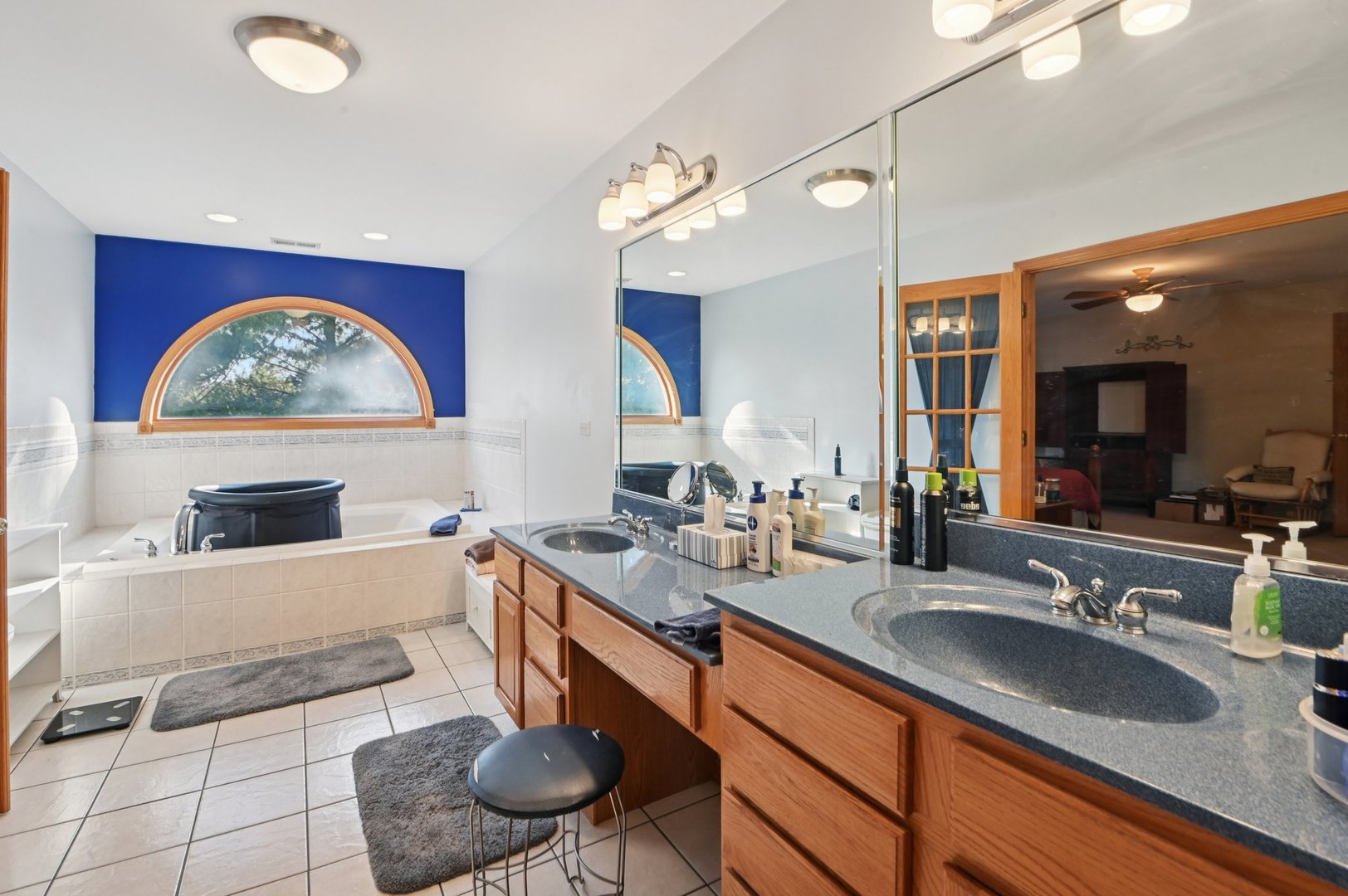 1575 Benton Street Crete, IL 60417 - Photo 48 of 66 a kitchen with a sink and a stove with wooden floor