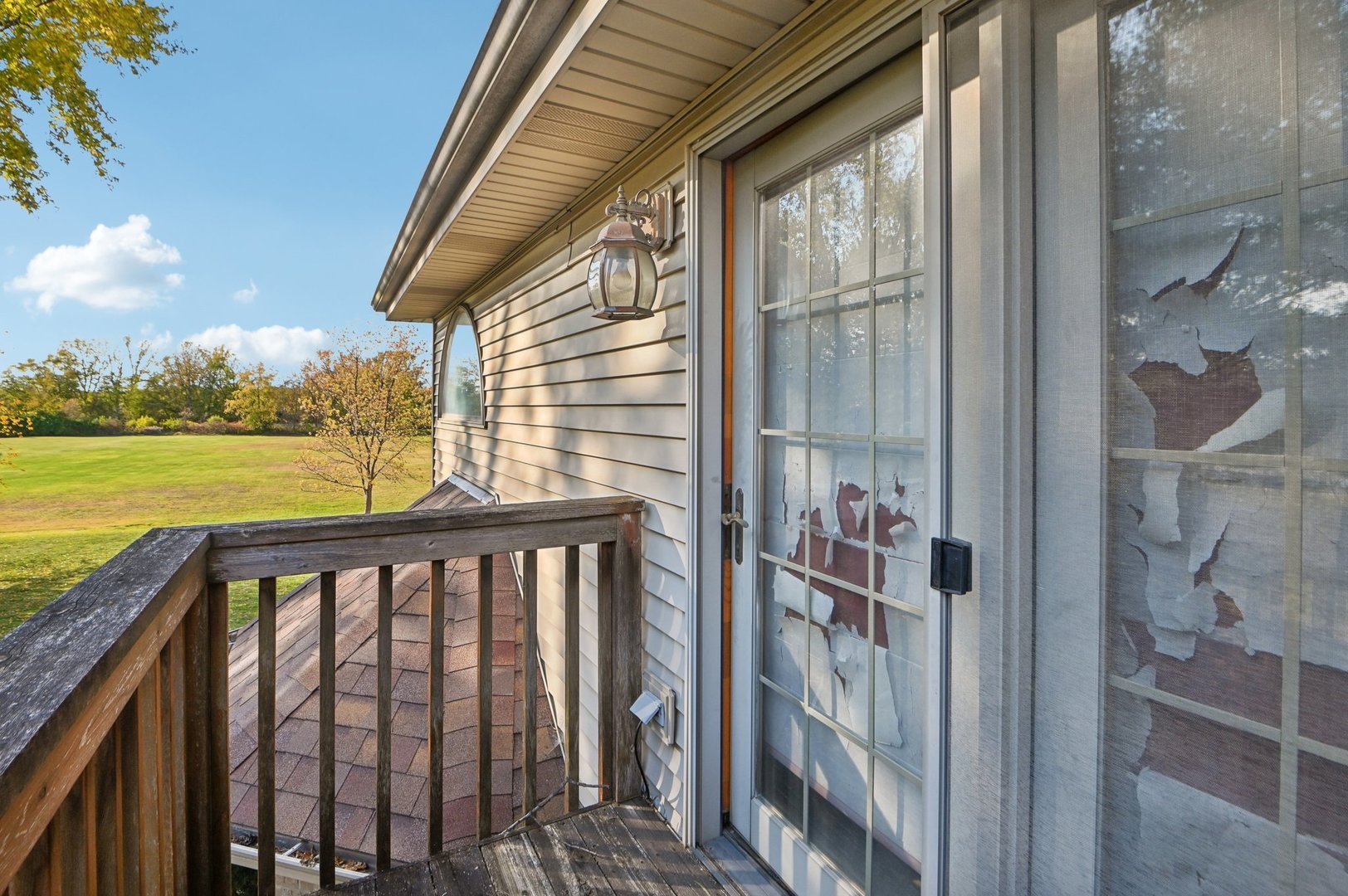1575 Benton Street Crete, IL 60417 - Photo 55 of 66 a view of a balcony with wooden floor and outdoor space