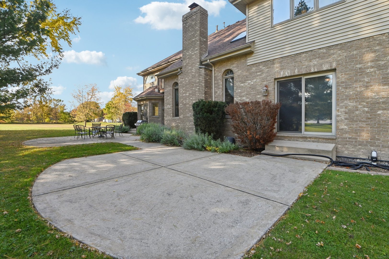 1575 Benton Street Crete, IL 60417 - Photo 58 of 66 a view of a house with a yard and pathway