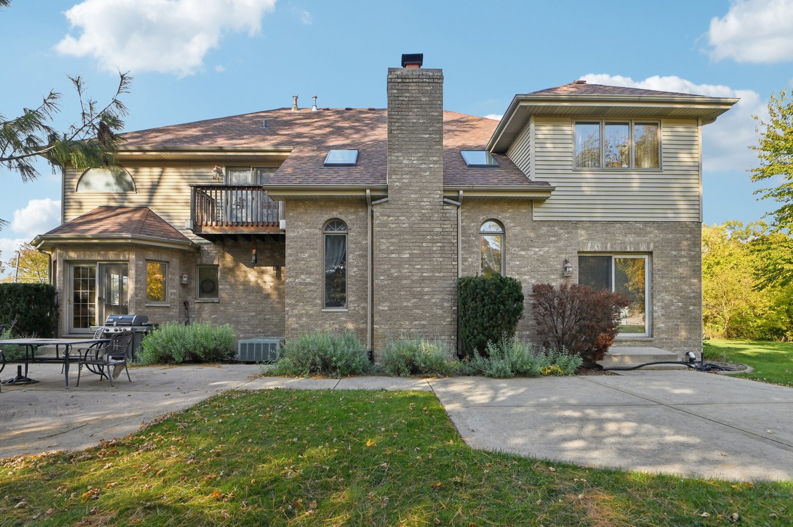 1575 Benton Street Crete, IL 60417 - Photo 59 of 66 a front view of a house with yard and porch