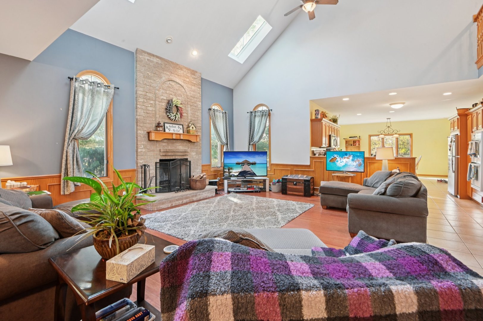 1575 Benton Street Crete, IL 60417 - Photo 10 of 66 a living room with furniture fireplace and a large window
