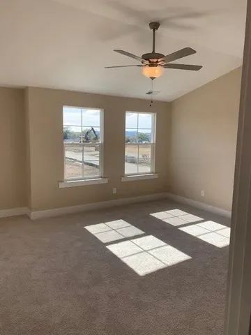 a view of an empty room and window