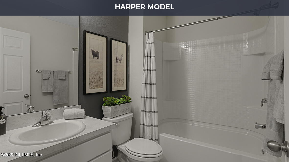 77 Java Lane St. Augustine, FL 32092 - Photo 13 of 31 a bathroom with a sink toilet and shower