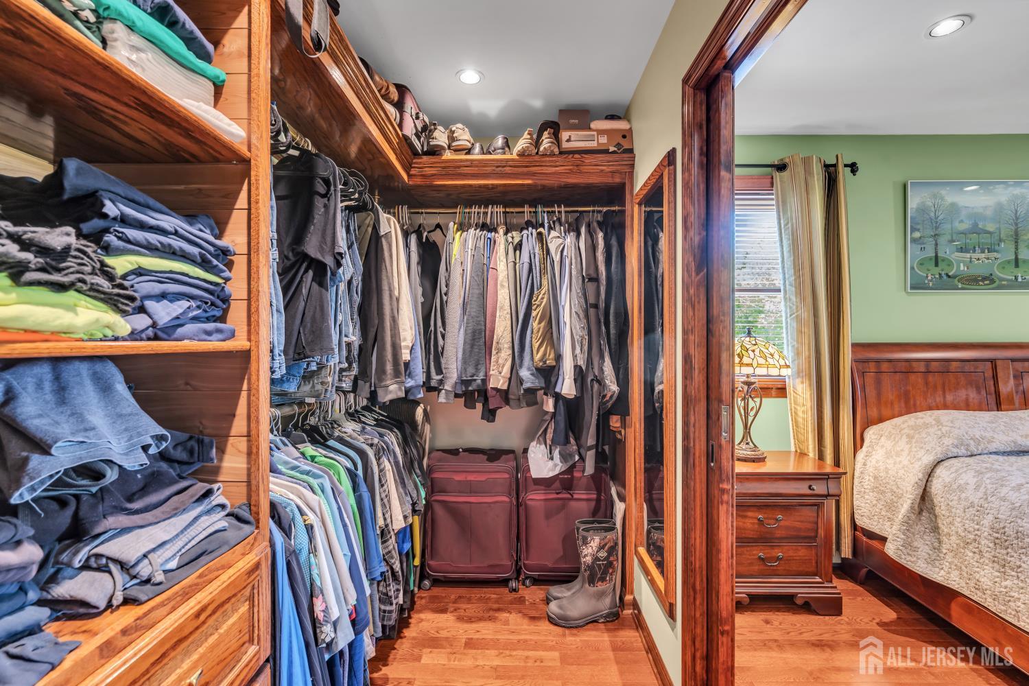 99 Schulmeister Road Old Bridge, NJ 08857 - Photo 24 of 49 a view of walk in closet with clothes and shoes