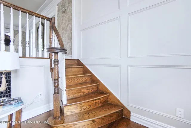 a view of entryway with wooden floor
