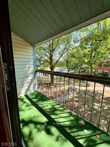 a view of yard from a balcony
