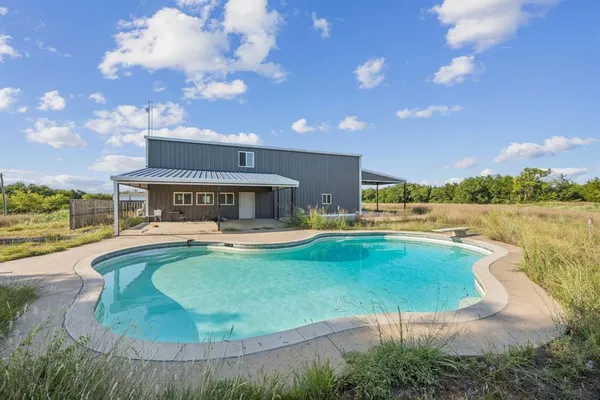 a view of a swimming pool and lake view